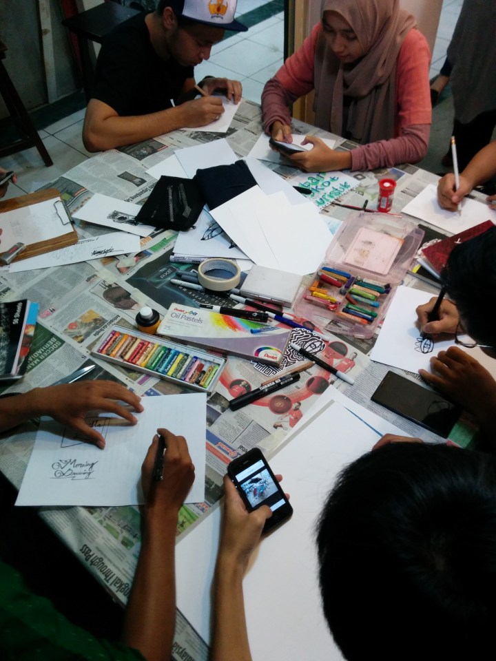 The Morning Drawing community invited passersby to sit, draw, and have their pictures exhibited on the walls.